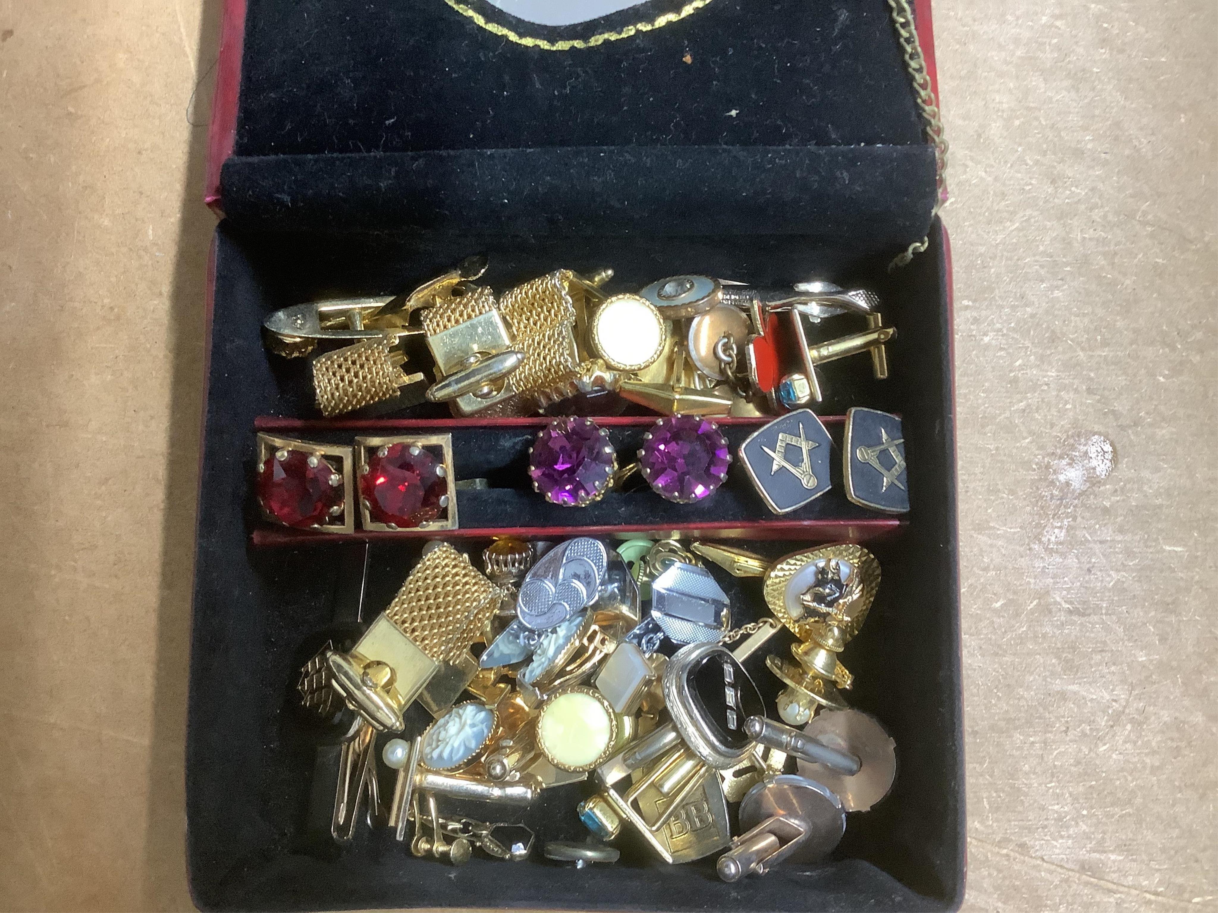 A large quantity of assorted costume jewellery including necklaces, cufflinks, brooches etc. including one part of a Arts & Crafts pewter and Ruskin enamel belt buckle by Norman & Ernest Spittle for the Guild Button and